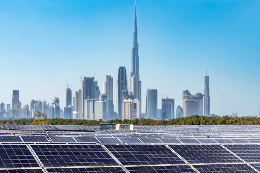 Solar power station with city skyline,dubai,UAE. Getty Images Image used for illustrative purpose , Getty Images