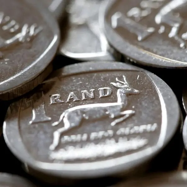 South African rand hovers near record low on dollar strength