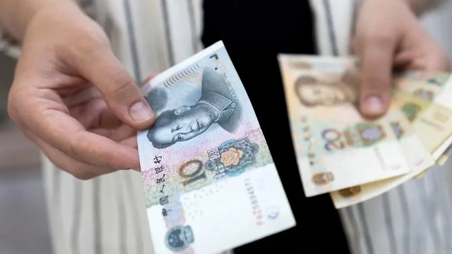 China's yuan set to end the week near 13-month low