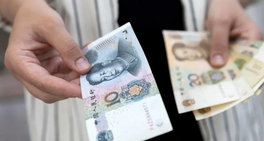 China's yuan set to end the week near 13-month low