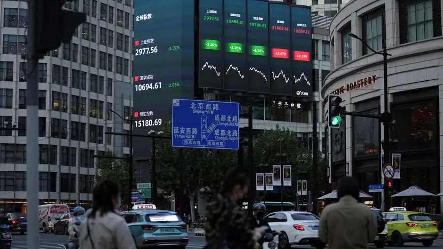 China stocks rise on expectations of policy support; Hong Kong slips