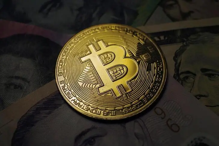 A representation of the virtual cryptocurrency Bitcoin is seen in this picture illustration taken October 18, 2021. , Edgar Su