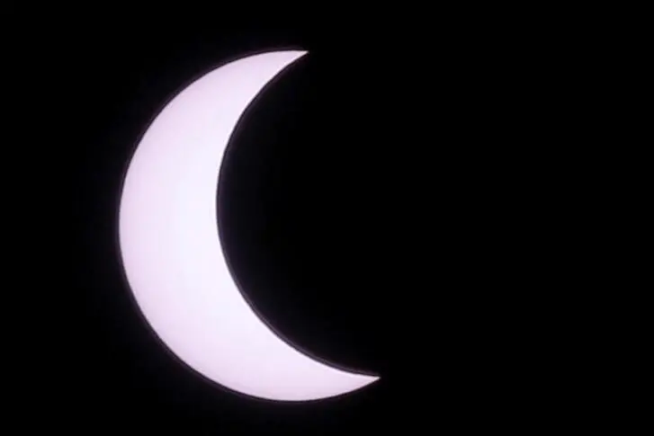 A photo shows a partial solar eclipse observed in Riyadh, Saudi Arabia June 21, 2020. REUTERS/Ahmed Yosri Image used for illustrative purpose.
