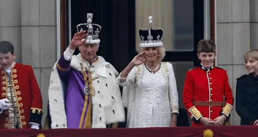 King Charles waves from balcony but no Harry