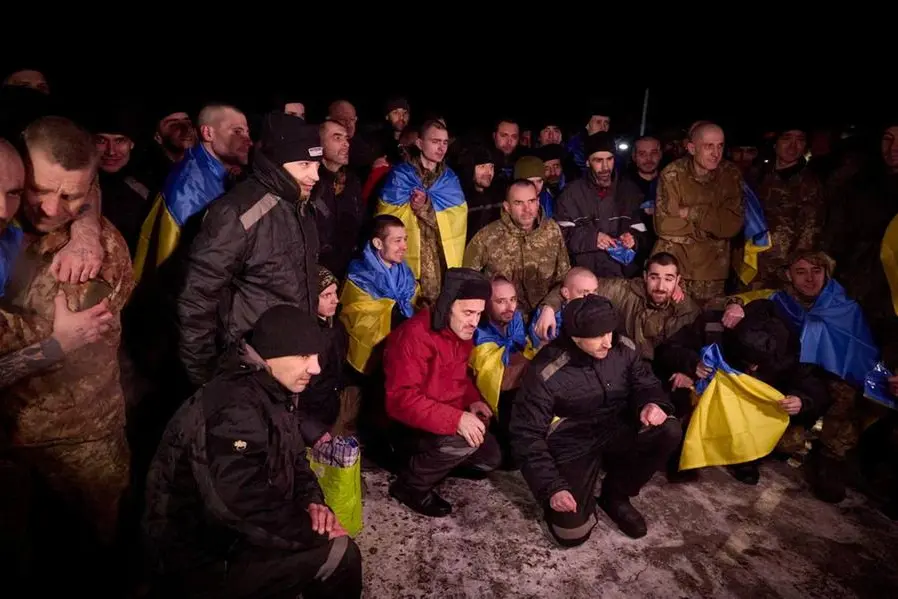 Ukrainian prisoners of war (POWs) react after a swap, amid Russia\\'s attack on Ukraine, at an unknown location in Ukraine, in this handout picture released January 3, 2024. Ukrainian Presidential Press Service/Handout via REUTERS