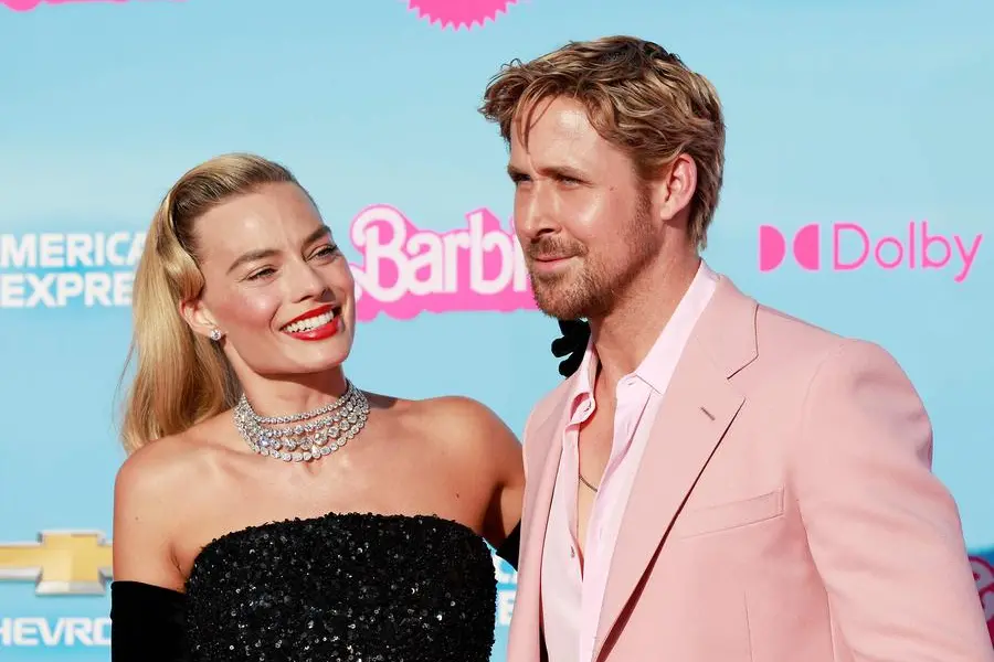 CORRECTION / Australian actress Margot Robbie and Canadian actor Ryan Gosling arrive for the world premiere of \"Barbie\" at the Shrine Auditorium in Los Angeles, on July 9, 2023. (Photo by Michael Tran / AFP) / \\uFFFDThe erroneous mention[s] appearing in the metadata of this photo by Michael Tran has been modified in AFP systems in the following manner: [Canadian actor Ryan Gosling] instead of [Canadian-US actor Ryan Reynolds]. Please immediately remove the erroneous mention[s] from all your online services and delete it (them) from your servers. If you have been authorized by AFP to distribute it (them) to third parties, please ensure that the same actions are carried out by them. Failure to promptly comply with these instructions will entail liability on your part for any continued or post notification usage. Therefore we thank you very much for all your attention and prompt action. We are sorry for the inconvenience this notification may cause and remain at your disposal for any further information you may require.\\uFFFD , Agence France-Presse (AFP)/AFP