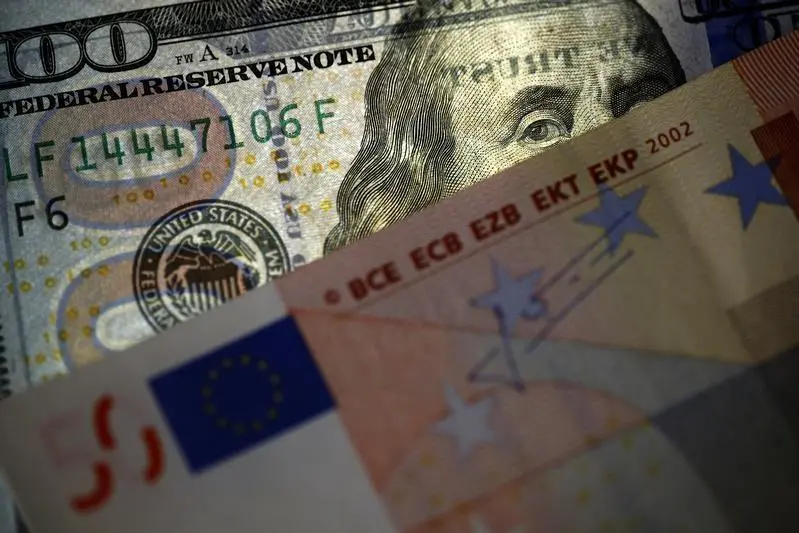 A picture illustration shows U.S. Dollar and Euro banknotes in Sofia March 12, 2015. REUTERS/Stoyan Nenov , Reuters Images