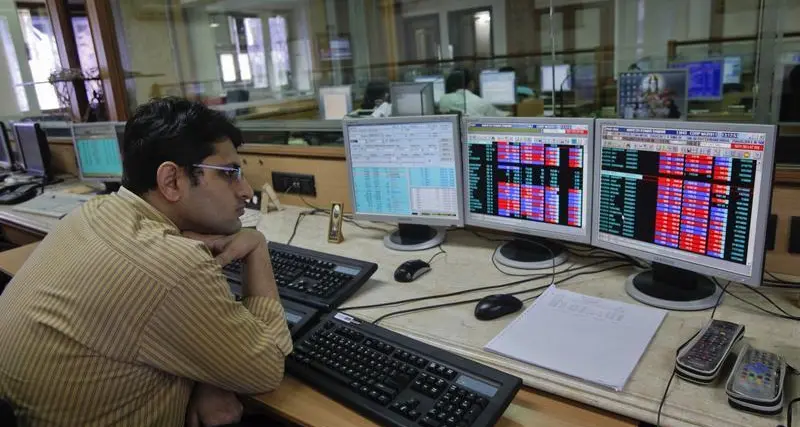 Indian shares gain after Fed dismisses rate hike views, oil prices fall