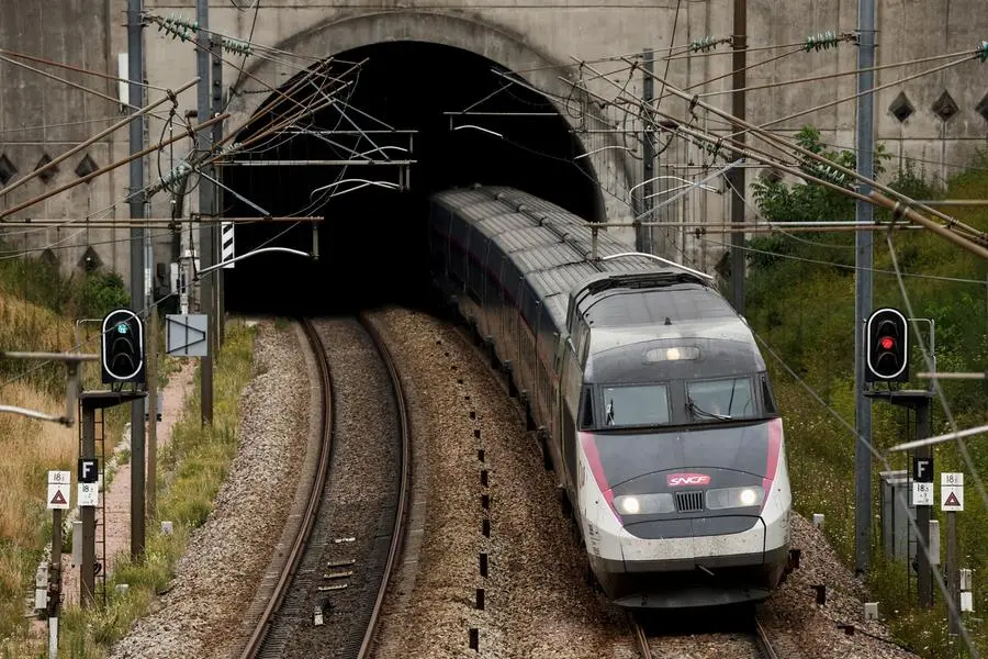 FILE PHOTO: A TGV inOui high-speed train operated by state-owned railway company SNCF is seen on a rail track outside Villebon-Sur-Yvette, near Paris, France, August 1, 2022. REUTERS/Benoit Tessier/File Photo , Reuters/REUTERS