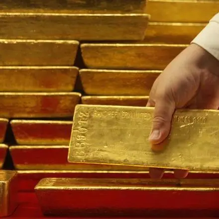 Gold extends slide as hawkish Fed, firm dollar dominate mood