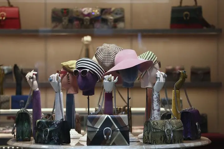 Gucci products are displayed in the window of a store on Old Bond Street in London, Britain June 2, 2016. Image for illustrative purpose only. REUTERS/Neil Hall