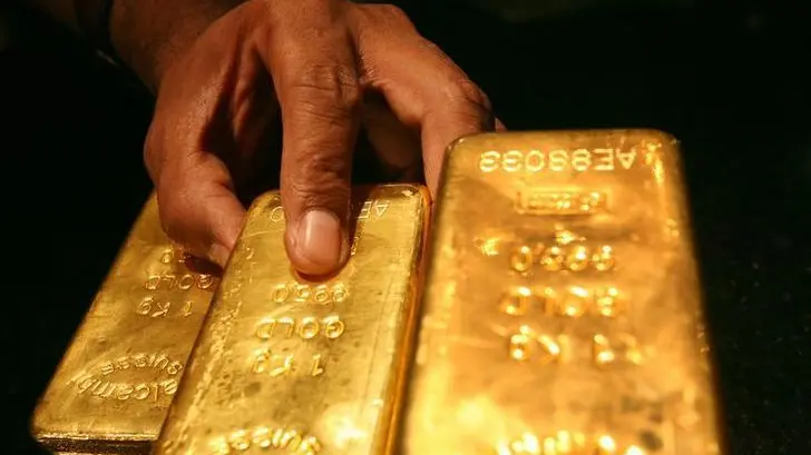 Gold dips with US economic data in focus