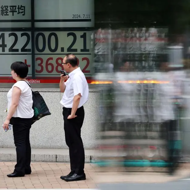 Japanese stocks head for best week in 4 years as receding growth fears lift markets