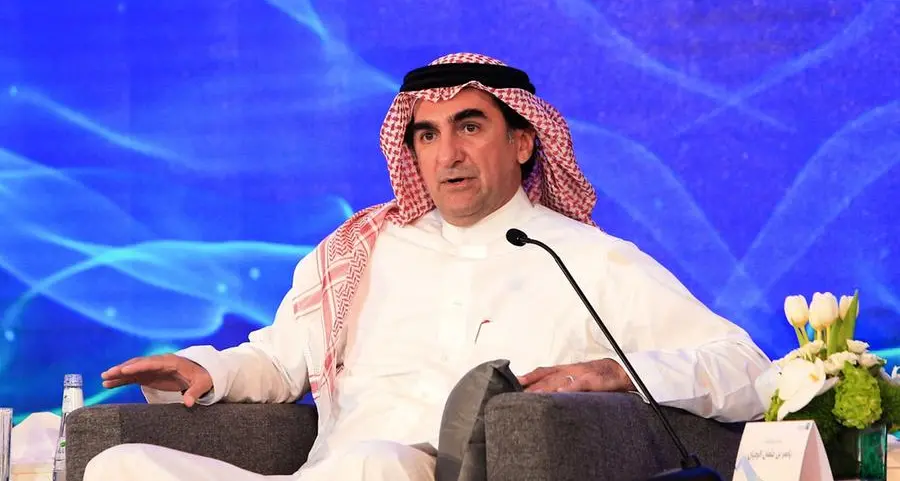 Head of Saudi wealth fund says governments, businesses have to reduce spending