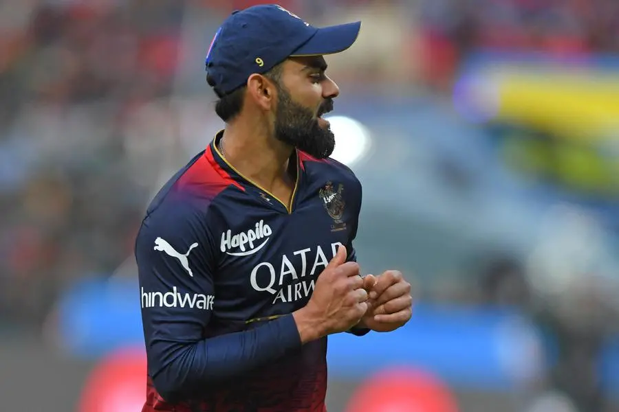 Royal Challengers Bangalore\\'s Virat Kohli reacts during the Indian Premier League (IPL) Twenty20 cricket match between Royal Challengers Bangalore and Delhi Capitals at the M Chinnaswamy Stadium in Bengaluru on April 15, 2023. (Photo by Manjunath KIRAN / AFP) , Agence France-Presse (AFP)/AFP