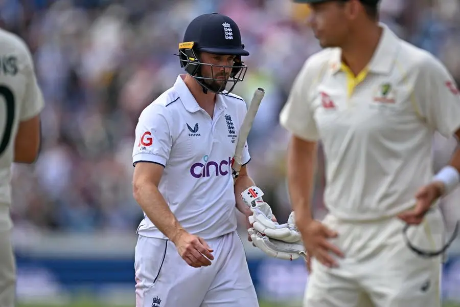 England\\'s Chris Woakes reacts as he walks back to the pavilion after losing his wicket for 10 runs on day two of the third Ashes cricket Test match between England and Australia at Headingley cricket ground in Leeds, northern England on July 7, 2023. (Photo by Paul ELLIS / AFP) , AFP