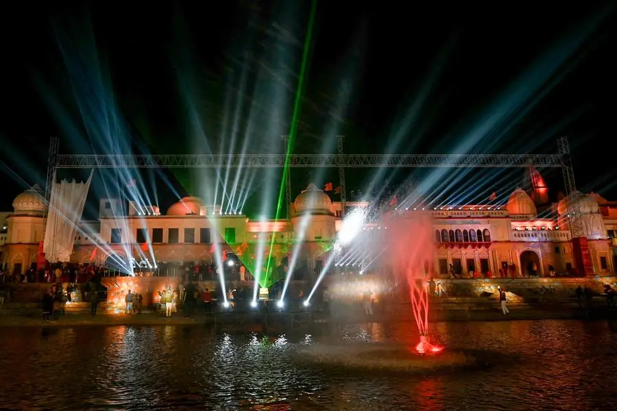 A laser show on the banks of Sarayu River in Ayodhya on January 21, 2024, on the eve of the consecration ceremony of a temple to Hindu deity Ram. India's Prime Minister Narendra Modi will on January 22 inaugurate a temple that embodies the triumph of his muscular Hindu nationalist politics, in an unofficial start to his re-election campaign this year. (Photo by Money SHARMA / AFP)