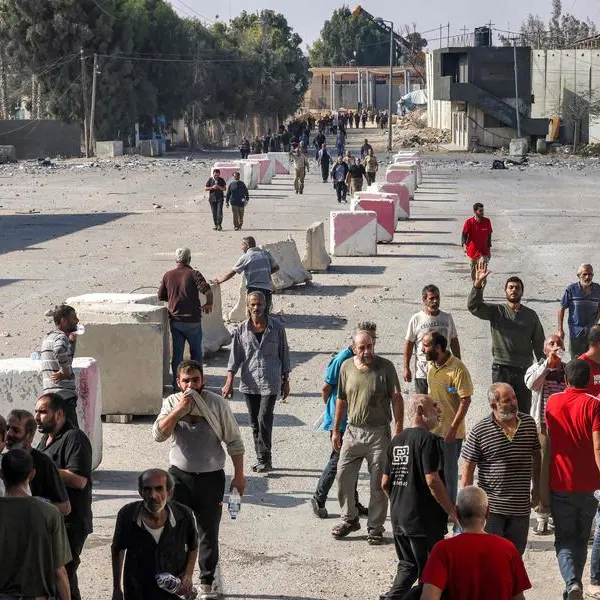 Israel begins returning Palestinian workers to Gaza: border official