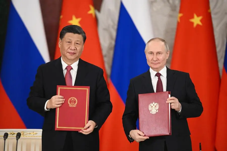 Russia's Putin plans to meet Xi in China this month, Bloomberg reports