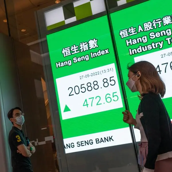 Asian markets swing as China economic growth slows