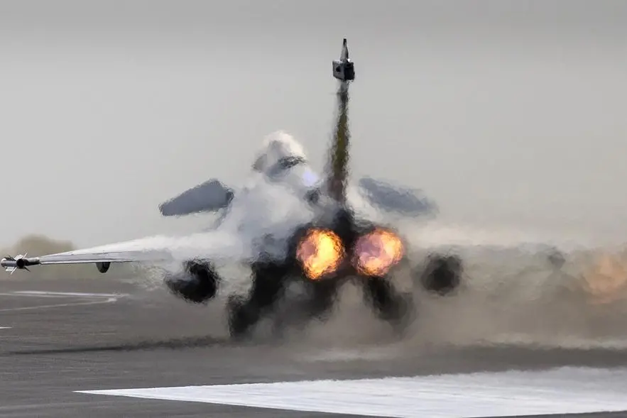 (FILES) This photograph taken October 19, 2023, shows a French multirole fighter aircraft Rafale F4 taking off from the French Navy airbase of Landivisiau, western France. France has ordered 42 new Rafale fighter jets, Defence Minister Sebastien Lecornu said January 12, 2024, with the first to be delivered in 2027. Bringing the total number of Rafales bought by Paris to 234, the five-billion-euro ($5.5 billion) order for the latest version of the Dassault planes would offer \"modernised operational capabilities\" to the French air force, Lecornu said. (Photo by Fred TANNEAU / AFP) , Agence France-Presse (AFP)/AFP