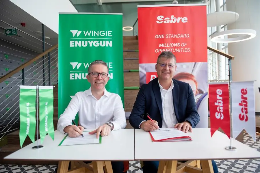 Wingie Enuygun CEO and founder, \\u00C7a\\u011Flar Erol and Altug Bekdemir, General Manager, Sabre Turkey signing the agreement