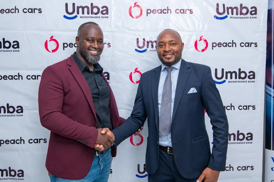 <p>L-R, Martin Mugo, Branch Manager at Peach Cars shakes hands with Alvan Gesaka, Senior Credit Officer at Umba Microfinance Bank. Umba Microfinance Bank and Peach Cars have partnered to offer customers 24hr financing for locally used cars</p>\\n