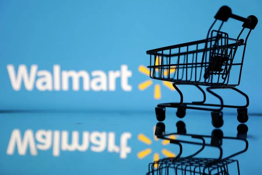 Shopping trolley is seen in front of Walmart logo in this illustration, July 24, 2022. REUTERS/Dado Ruvic/Illustration , Reuters