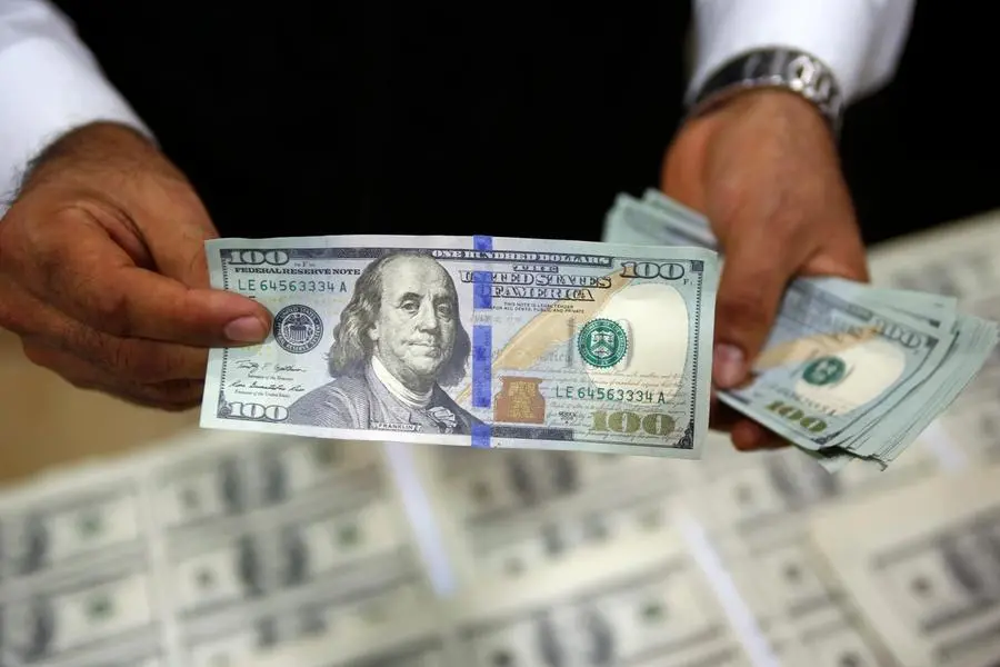 Dollar steady and London shares higher before Fed update on rates