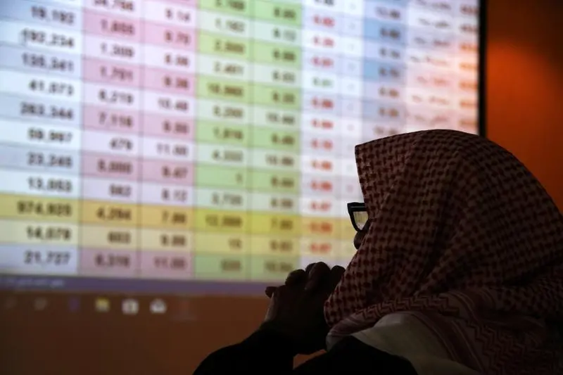 A Saudi trader monitors stocks at the Saudi stock market in Riyadh, Saudi Arabia, January 8, 2020. , Reuters Images/Ahmed Yosri 