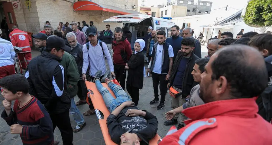 Medic says 50 killed as Israel fires on Gazans rushing to aid trucks