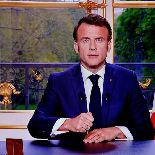 Macron defends pension reform, understands 'anger'