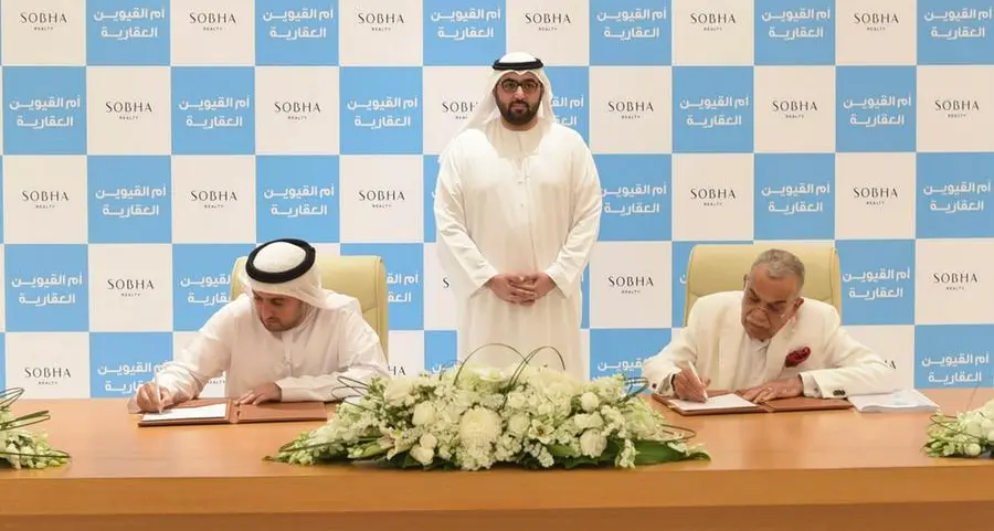 Rashid bin Saud Al Mualla witnesses the signing of a partnership agreement between Umm Al Quwain Properties and Sobha Realty