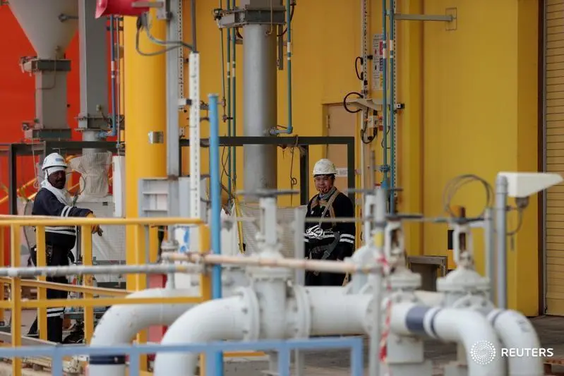 Image used for illustrative purpose. Workers are seen at the Borouge petrochemical facility at ADNOC\\'s Ruwais Industrial Complex in Ruwais, United Arab Emirates May 14, 2018. , Reuters Images/Christopher Pike