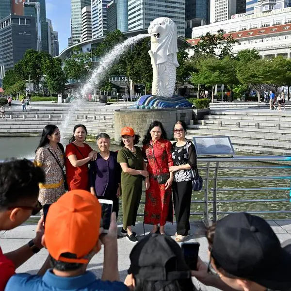 After opening borders, China presses Singapore for visa-free travel deal