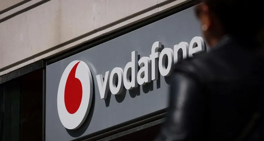 Cost-cutting Vodafone reports sliding revenues