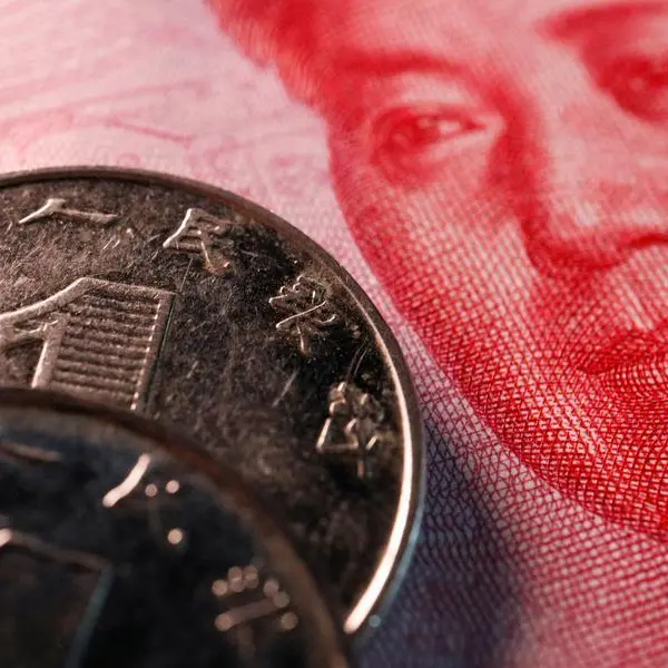 China's yuan dips against dollar, downward pressure persists