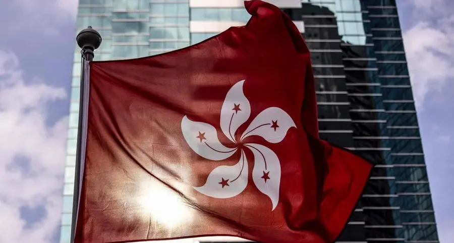 Hong Kong cancels passports of six democracy activists