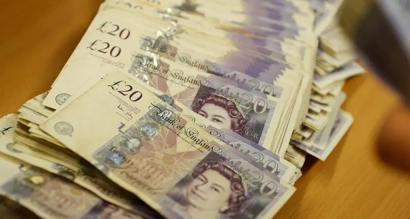 Sterling hits strongest in two months on euro in holiday-thinned trade