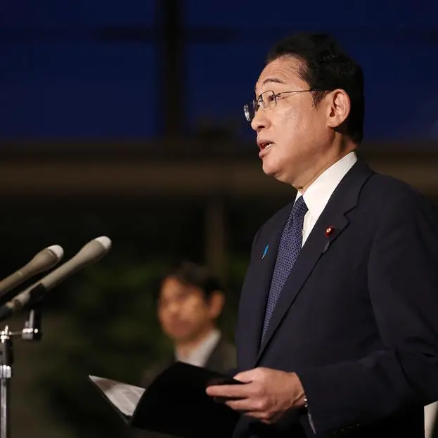 Japan PM eats 'safe and delicious' Fukushima fish