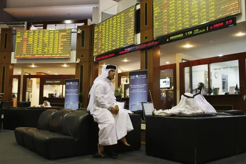 An investor monitors an electronic board displaying stock information at the Dubai Financial Market June 13, 2013. Ahmed Jadallah, Reuters , Reuters Images