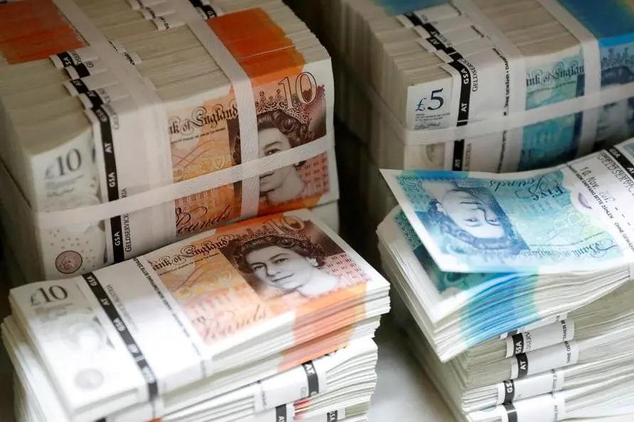 FILE PHOTO: Wads of British Pound Sterling banknotes are stacked in piles at the Money Service Austria company\\'s headquarters in Vienna, Austria, November 16, 2017. REUTERS/Leonhard Foeger/File Photo , Reuters/REUTERS