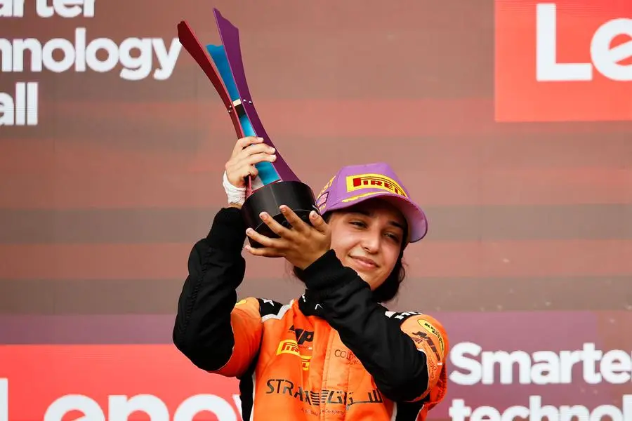 AUSTIN, TEXAS - OCTOBER 21: Race winner Hamda Al Qubaisi of United Arab Emirates and MP Motorsport (4) celebrates on the podium during F1 Academy Series Round 7:Austin race 2 at Circuit of The Americas on October 21, 2023 in Austin, Texas. (Photo by Chris Graythen/Getty Images) , Getty Images