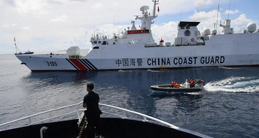 China warns Philippines not to 'stir up trouble' over disputed reef