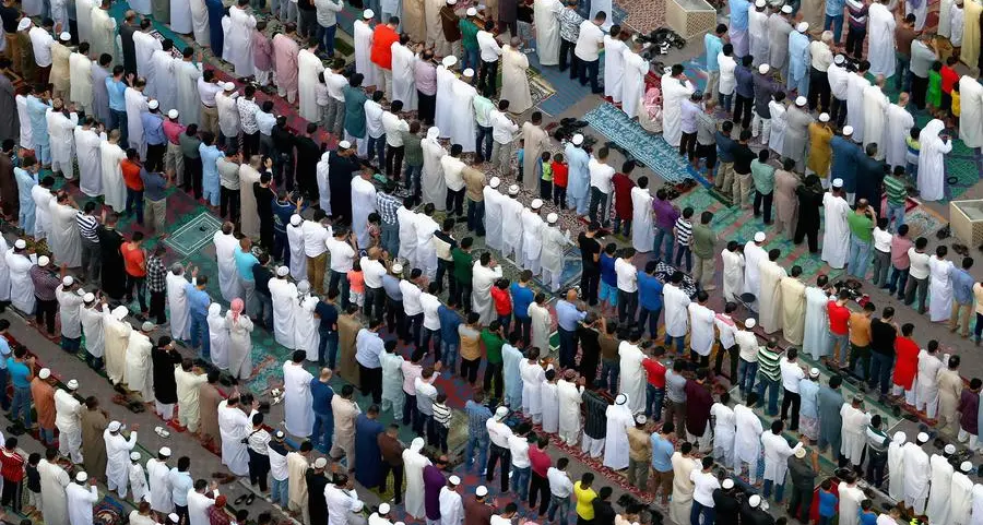 Hundreds of Muslims offer Eid Al Fitr prayers, share greetings at open-air musallahs as sun rises on first day after Ramadan