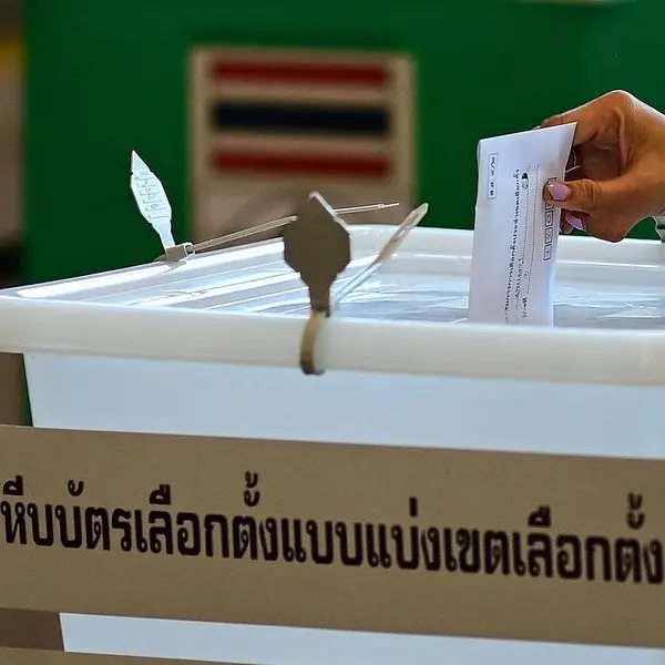 Thais queue at temples, schools as early voting begins