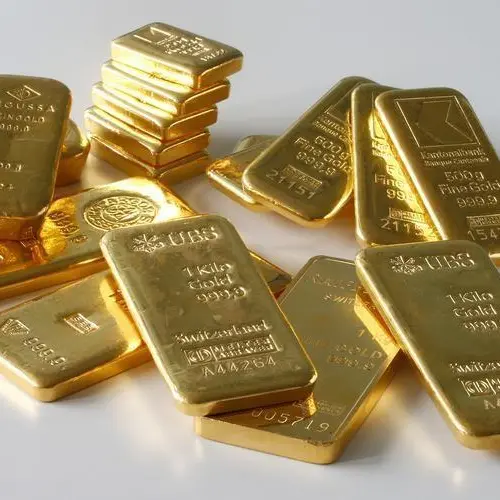 Gold little changed as traders eye Fed cues