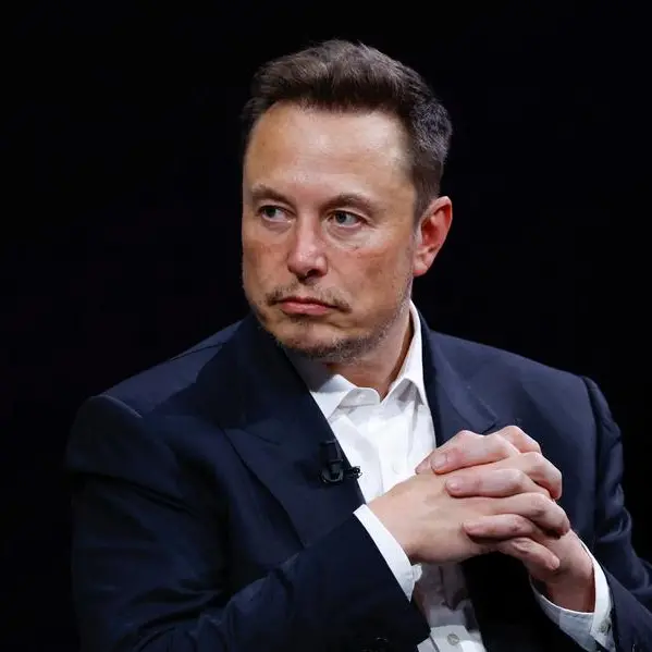 Tesla CEO Elon Musk kicks off surprise trip to Beijing, sources say