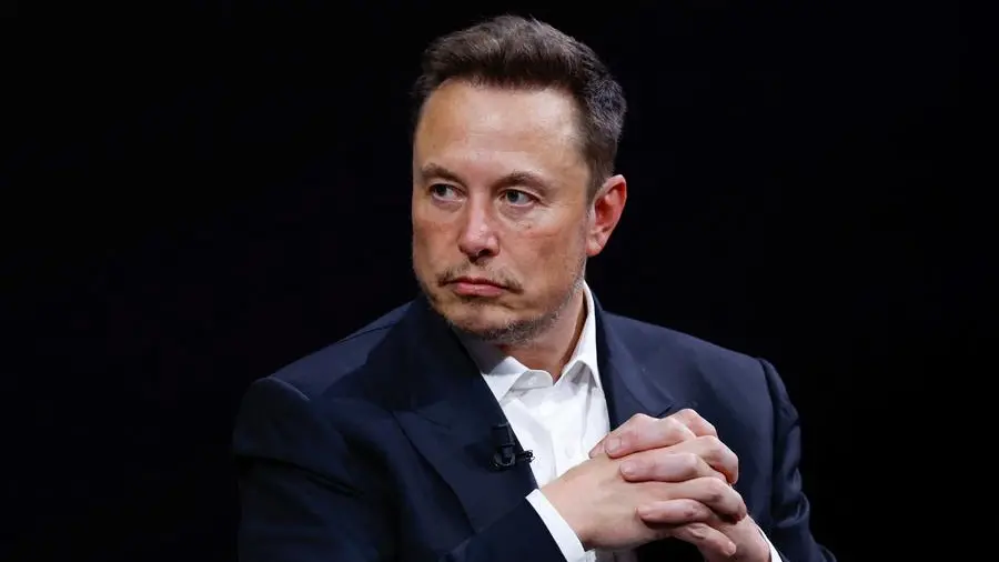 Tesla CEO Elon Musk kicks off surprise trip to Beijing, sources say