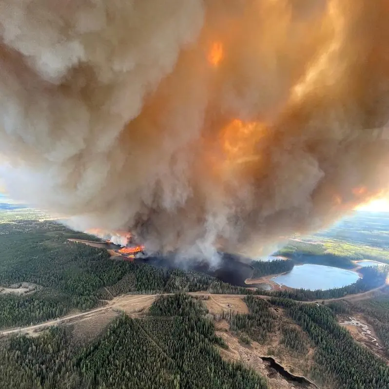 Fire and floods across western Canada force evacuations